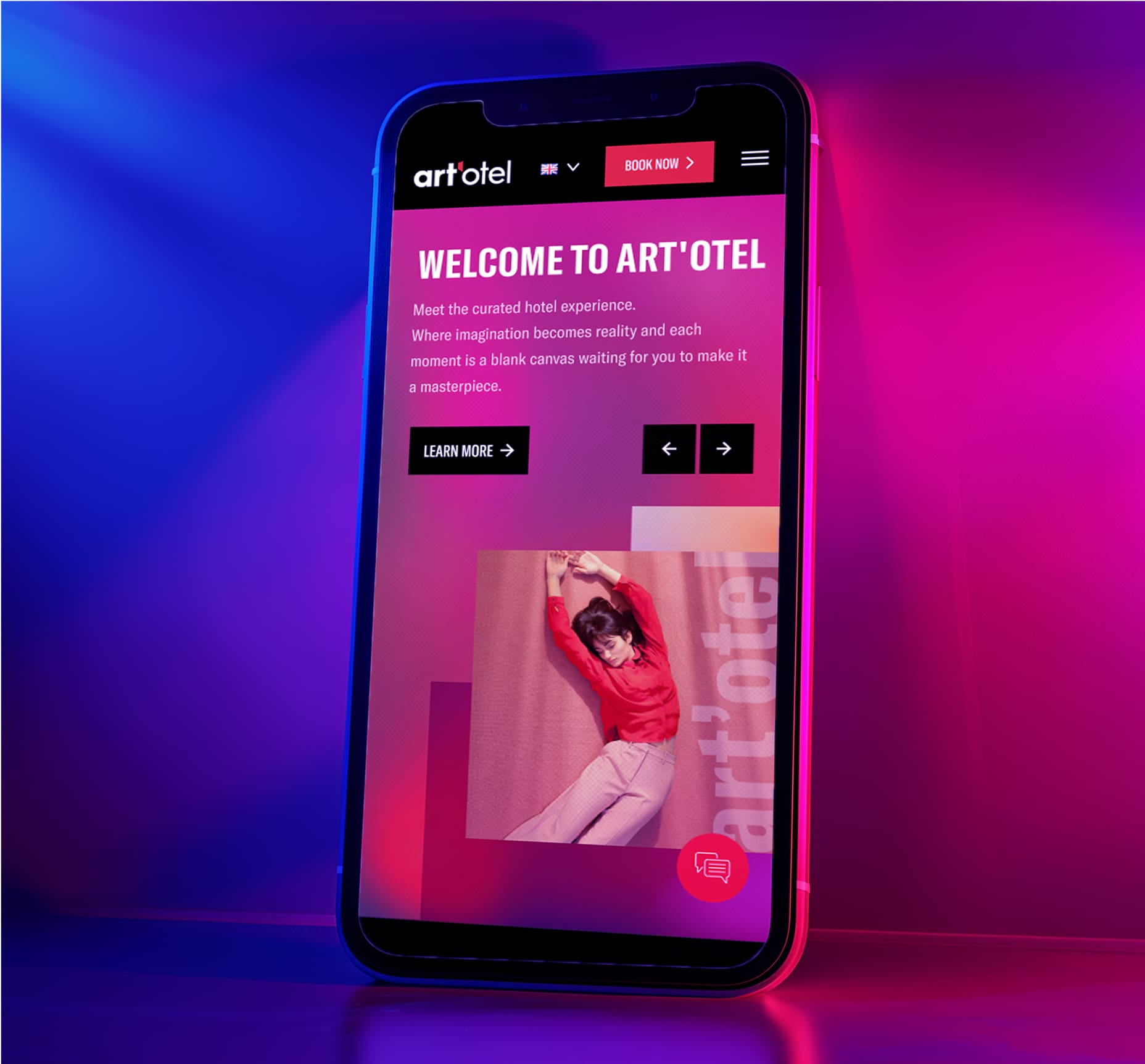 A smartphone displays the Art'otel website, featuring a welcome message and an image of a dancer in red. The screen glows with purple and pink neon lighting.